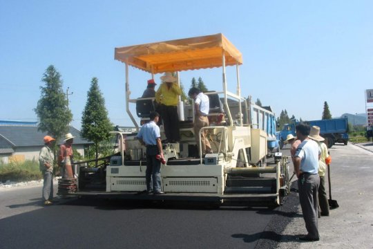 HW Asphalt Paver In Vietnam Working Site